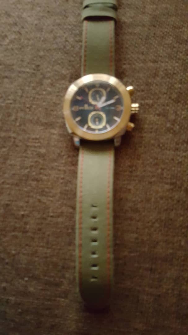 Nice gold colored watch swisros
