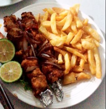 Fish Brochette Served with chips